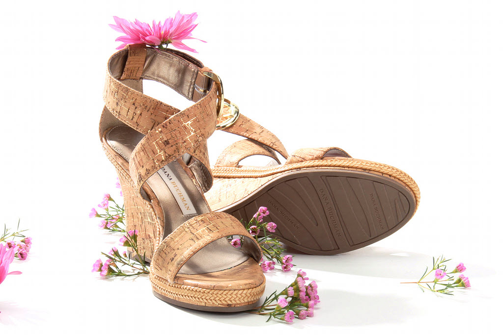 A shoes with flowers in them.